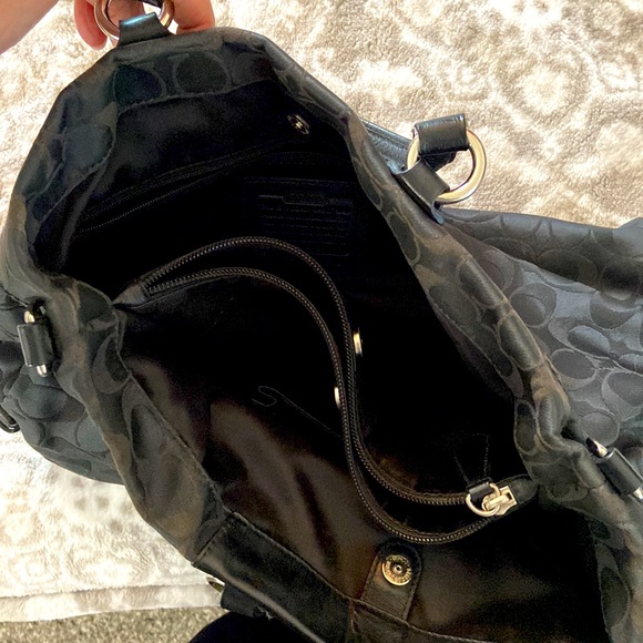 Signature C Coach black purse. Three compartments. Barely used.